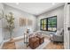 Comfortable office with natural light, neutral tones, and a cozy seating area at 1 Linestowe Dr, Belmont, NC 28012