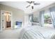 Spacious bedroom featuring en-suite bathroom access and a large window at 101 Stonehurst Ln, Waxhaw, NC 28173
