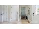 Welcoming entryway with a bench and coat rack, creating an organized and inviting space at 101 Stonehurst Ln, Waxhaw, NC 28173
