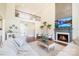 Spacious living room featuring a fireplace, hardwood floors, and balcony view at 101 Stonehurst Ln, Waxhaw, NC 28173