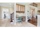 Dedicated office nook with built-in cabinets and desk, located near the staircase at 101 Stonehurst Ln, Waxhaw, NC 28173