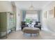 Cozy sitting room with comfortable seating, pendant lighting, and view of outdoors at 101 Stonehurst Ln, Waxhaw, NC 28173