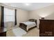 Bedroom featuring carpet, a window, and neutral colored walls at 10116 Garman Hill Dr, Charlotte, NC 28214