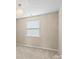 Bright bedroom features neutral walls, carpet, and window with blinds at 10116 Garman Hill Dr, Charlotte, NC 28214