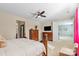 Spacious bedroom features ceiling fan, sitting area, and an attached room, perfect for relaxation at 10116 Garman Hill Dr, Charlotte, NC 28214