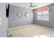 Bright bedroom with plush carpet, modern decor, and natural light at 10116 Garman Hill Dr, Charlotte, NC 28214