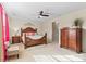 Serene main bedroom boasting a ceiling fan and generous natural light at 10116 Garman Hill Dr, Charlotte, NC 28214