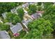 Aerial shot featuring homes with verdant tree coverage, manicured lawns and neighborhood streets at 11913 Little Stoney Ct, Charlotte, NC 28269