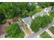 Aerial view of a home with a well manicured lawn, mature trees and neighborhood streets at 11913 Little Stoney Ct, Charlotte, NC 28269