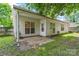 Backyard featuring a patio, ample green space and lots of natural light at 11913 Little Stoney Ct, Charlotte, NC 28269