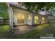 Enhanced backyard featuring a patio, ample green space and lots of natural light at 11913 Little Stoney Ct, Charlotte, NC 28269