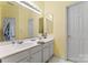Bathroom featuring a vanity with double sinks at 11913 Little Stoney Ct, Charlotte, NC 28269