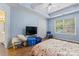 Bright bedroom with hardwood floors, large window, and ample storage space at 11913 Little Stoney Ct, Charlotte, NC 28269