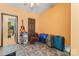 Bedroom with a guitar, tiled floor, and ample space, offering a creative atmosphere at 11913 Little Stoney Ct, Charlotte, NC 28269