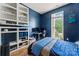 Inviting bedroom featuring a workspace and a window with natural light at 11913 Little Stoney Ct, Charlotte, NC 28269