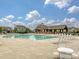 Large community pool with ample seating and a covered pavilion for residents' enjoyment at 12641 Glowing Peak Rd, Huntersville, NC 28078