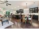 Bright, open-concept area featuring a kitchen with island seating, dining area, and living space at 12641 Glowing Peak Rd, Huntersville, NC 28078