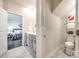 This bathroom shows a double vanity and an entry to the main bedroom at 13210 Kenworth Rd, Charlotte, NC 28278