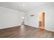Spacious bonus room with hardwood floors, ample natural light, and walk-in closet at 13210 Kenworth Rd, Charlotte, NC 28278