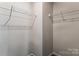 Well-organized closet space with wire shelving, providing practical storage solutions for efficient living at 13210 Kenworth Rd, Charlotte, NC 28278