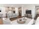 View of the kitchen and living room, with stainless steel appliances at 13210 Kenworth Rd, Charlotte, NC 28278