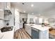 Spacious, open kitchen layout with a quartz countertop island, stainless steel appliances, and ample cabinets at 13210 Kenworth Rd, Charlotte, NC 28278