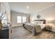 Inviting main bedroom showcases neutral tones, stylish decor, and ample natural light at 13210 Kenworth Rd, Charlotte, NC 28278