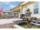 The back patio has an outdoor fountain with an overhang. The outdoor grill and furniture makes it an ideal space for relaxation at 1507 Riverwalk Pkwy, Rock Hill, SC 29730