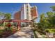 Unique Pump House condo building with industrial architecture and manicured landscaping at 1507 Riverwalk Pkwy, Rock Hill, SC 29730