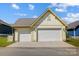 A well-maintained three-car garage providing ample space for vehicles and storage at 1507 Riverwalk Pkwy, Rock Hill, SC 29730