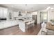 Bright kitchen with an island, stainless steel appliances, and hardwood floors at 1507 Riverwalk Pkwy, Rock Hill, SC 29730