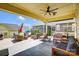 Covered patio featuring ample seating and views of the surrounding homes at 1507 Riverwalk Pkwy, Rock Hill, SC 29730