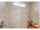 Shower featuring a small window and a wooden bench with a plant on it at 1507 Riverwalk Pkwy, Rock Hill, SC 29730