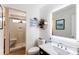 Bathroom with a shower, toilet, and sink featuring a modern vanity with great mirror lighting at 1509 Kirkbridge Ct, Matthews, NC 28105