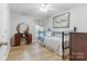 Inviting bedroom with a full bed, vanity and decorative art creating a cozy atmosphere at 1509 Kirkbridge Ct, Matthews, NC 28105