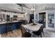 Spacious dining area with granite countertops, stainless steel appliances, and screened in patio at 1509 Kirkbridge Ct, Matthews, NC 28105