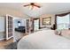Bright primary bedroom with double door entry to sitting room, neutral colors and vaulted ceiling at 1509 Kirkbridge Ct, Matthews, NC 28105
