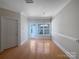 Bright dining room featuring stylish lighting and a view to the outdoors, perfect for Gathering meals at 151 Harper Lee St, Davidson, NC 28036