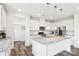 Well-lit kitchen with white cabinetry, granite countertops, and stainless steel appliances at 15108 Autumn Sage Dr, Charlotte, NC 28278