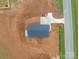 Top-down shot of a house showing the roof line and driveway, with a country road at 15700 Stokes Ferry Rd, Richfield, NC 28137