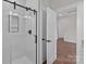 Sleek walk-in shower with glass door and white tile, offering a modern spa-like experience at 15700 Stokes Ferry Rd, Richfield, NC 28137