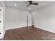 Bright bedroom with wood-look floors, light gray walls, and recessed lights at 15700 Stokes Ferry Rd, Richfield, NC 28137