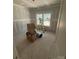 Unfinished bedroom displaying new construction with window letting in natural light at 15700 Stokes Ferry Rd, Richfield, NC 28137