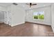 Bright living room boasts hardwood floors, ceiling fan, and views of outside at 15700 Stokes Ferry Rd, Richfield, NC 28137