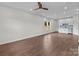 Spacious living room featuring hardwood floors, recessed lighting, and a modern kitchenette at 15700 Stokes Ferry Rd, Richfield, NC 28137