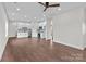 Open living area and kitchen showcase a modern design with stainless steel appliances at 15700 Stokes Ferry Rd, Richfield, NC 28137