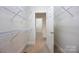 Walk-in closet with wire shelving at 16919 Hedgerow Park Rd, Charlotte, NC 28277