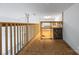 Loft above garage has plywood flooring, wooden railing, and multiple storage platforms at 16919 Hedgerow Park Rd, Charlotte, NC 28277