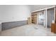 Small storage room features cement floors, block walls, and a single wooden shelf at 16919 Hedgerow Park Rd, Charlotte, NC 28277