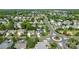 An aerial shot showcases a well-planned community layout with manicured lawns and lush greenery at 2006 Holly Villa Cir, Indian Trail, NC 28079